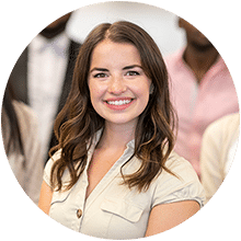 An administrator smiling for a portrait