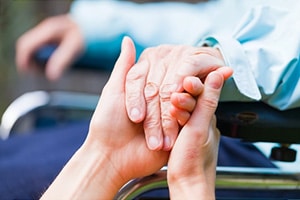 PACS-300x200-hands1 Nurse holding patients hand