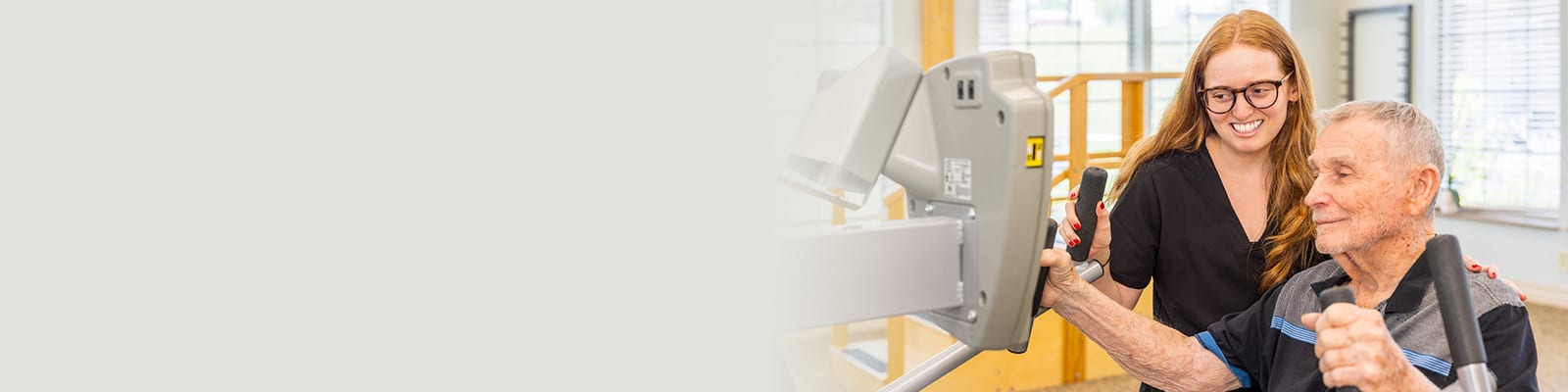 A physical therapist working with a man at Villages of St Peters