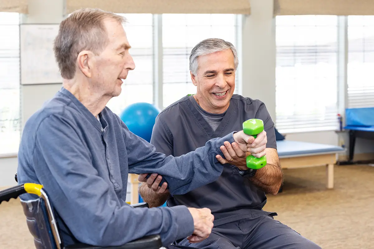 Physical therapist working with a resident at Villages of St Peters
