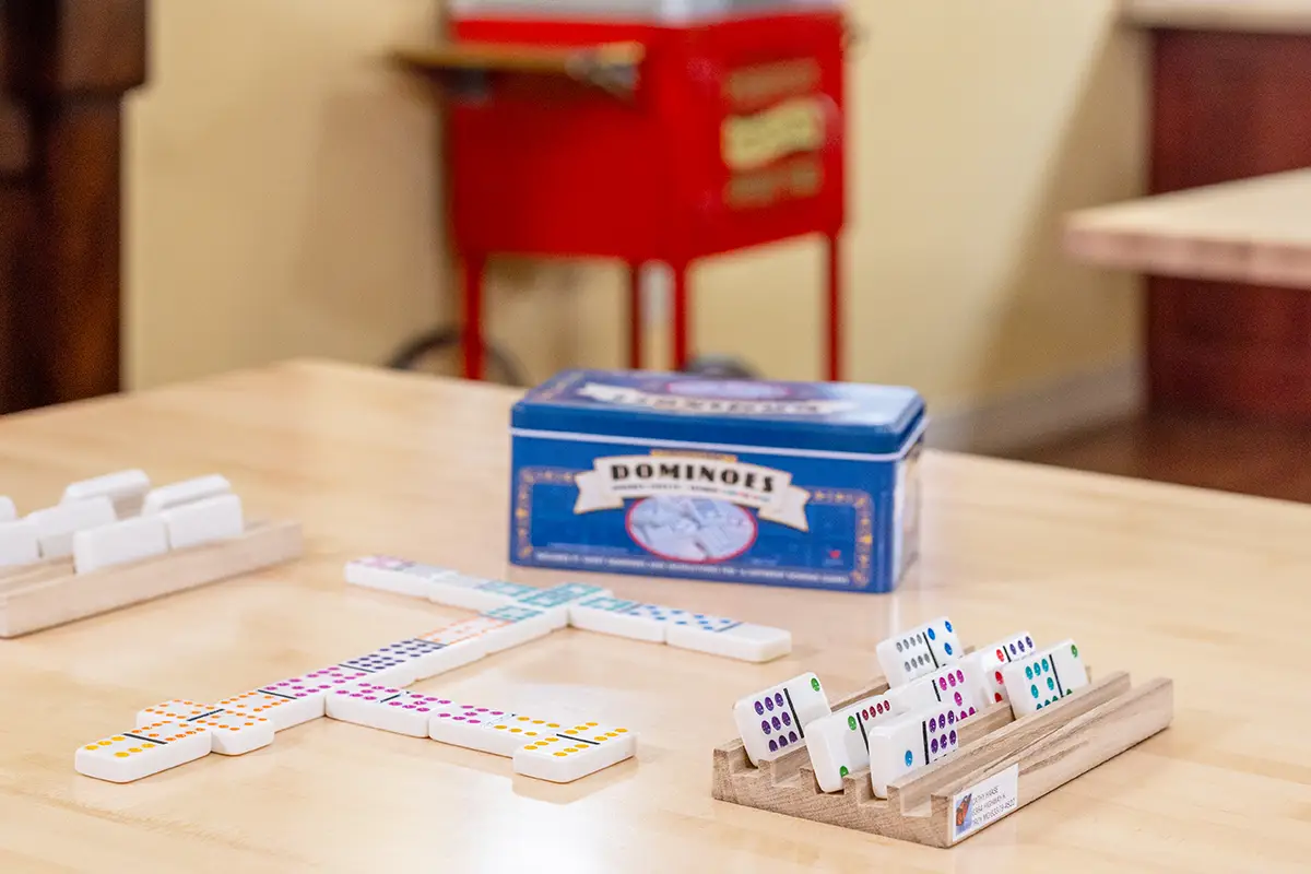 A table with dominos at Villages of St Peters
